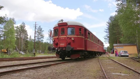 Multi unit arrival station passing by close view left to right Stock Footage