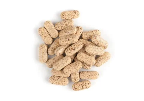 Multi vitamin tablets on white Foto stock