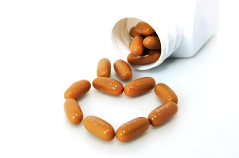Multi vitamin on white background Stock Photos