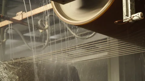 Multi-wire machine cutting granite Stock Footage 237340535