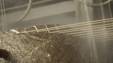 Multi-wire machine cutting stone Stock Footage 237340788