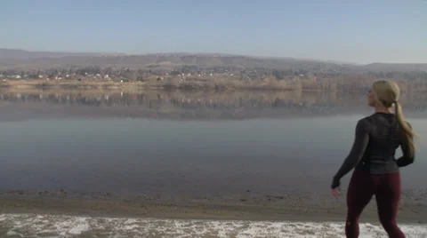 Multicam shot of Athlete by river Stock Footage 33689734