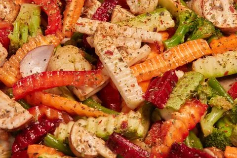 Multicolor background of sliced vegetables with dried spices Stock Photos