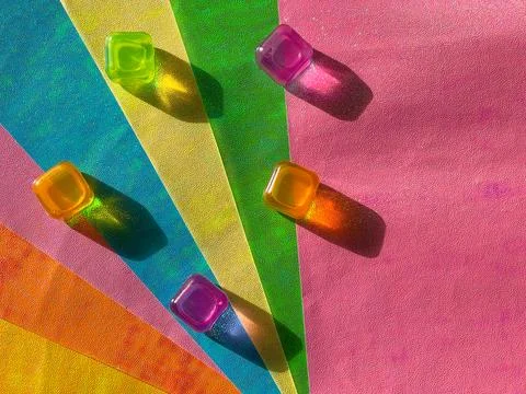 Multicolor background. Transparent cubes and colored shadows. Abstract Stock Photos