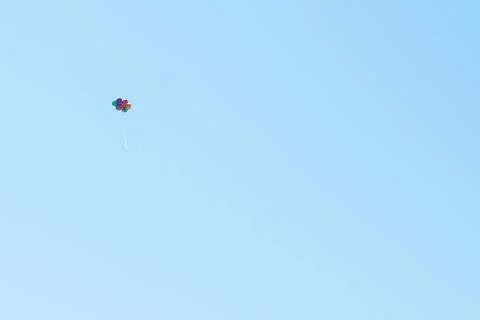 Multicolor baloons at the blue sky. Stock Photos