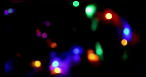 Multicolor, Blurry Lights on a Dark Background, Christmas or New Year Bokeh. Stock Footage 250317771