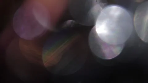 Multicolor bokeh screen glow effects in black 動画素材 318843566