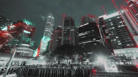 Multicolor bright explosion on gray city skyline. Cybercity concept Stock Footage 195323868