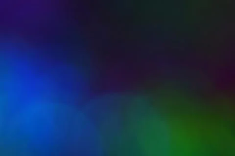 Multicolor bright large bokeh on a dark background. Macro. Copyspace. Stock-Illustration