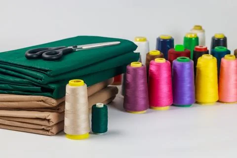Multicolor cotton thread spools for sewing. Stock Photos