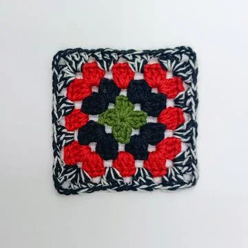 Multicolor crochet granny square pattern Stock Photos