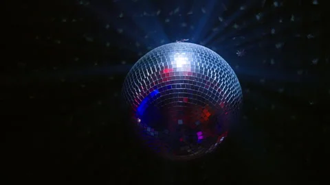 Multicolor Disco Ball Rotating with Blue and Red Neon Lights in Dark Club Vídeo Stock 334593535