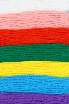 Multicolor embroidery threads background Stock Photos