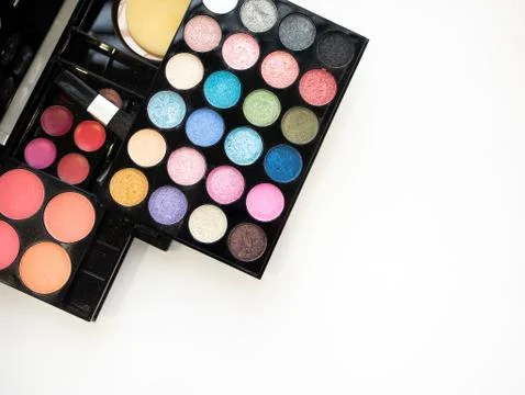 Multicolor eyeshadow palette beauty cosmetic makeup kit with lipstick and blush Stock Photos