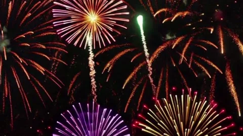 Multicolor Fireworks Exploding in Midnight Sky for New Year Event Stock Footage 344763251