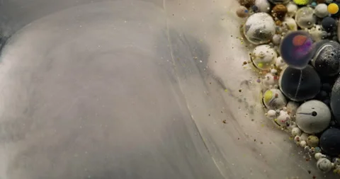 Multicolor fluid bubble paint shimmer swirl silver Stock Footage 303656849