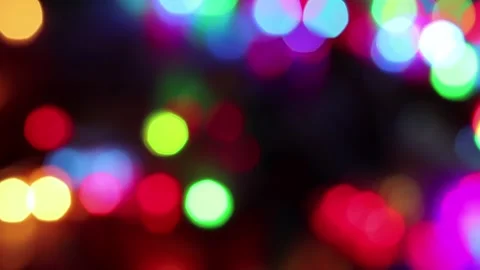 Multicolor lights bokeh sparkling blinking at night during festival celebrati Video stock 221741618