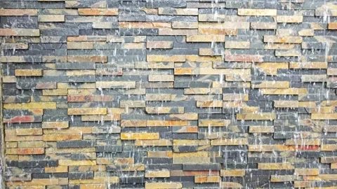 Multicolor Natural Stone Cladding Waterfall Wall Feature. 動画素材 340048061