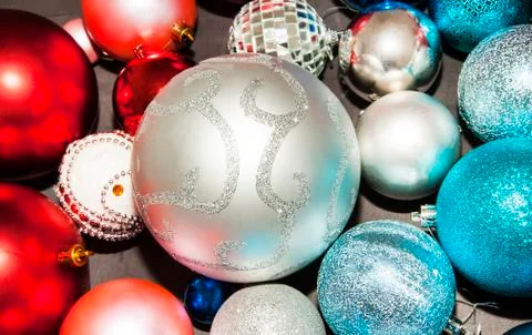 Multicolor New year decorations on dark background close up Stock Photos