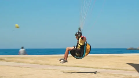 Multicolor parachute on beach. Video stock 236102464