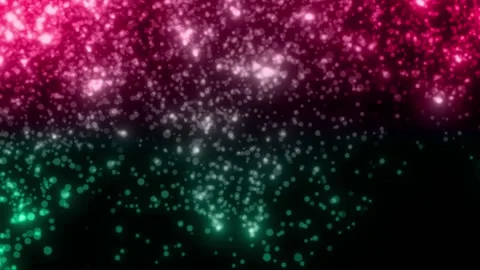 MULTICOLOR particles glowing on the black background. Black background with l Stock Footage 218579962