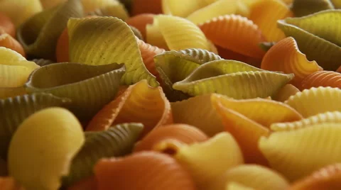 Multicolor pasta conchiglie close up rotation Stock Footage 47092216