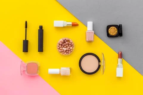 Multicolor pattern of makeup products and colorfull cosmetics. Flat lay top view Stock Photos