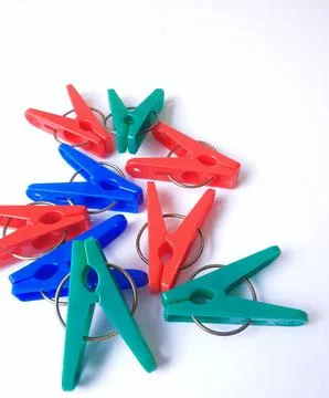 Multicolor plastic clothespin on white background 스톡 사진
