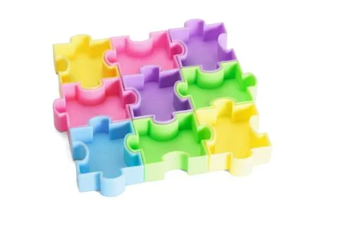 Multicolor plastic jigsaw puzzles Stock Photos