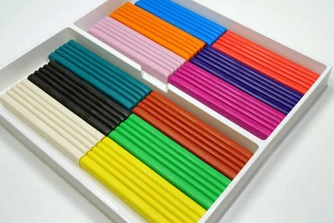 Multicolor plasticine in a box to help children develop creativity, dexteri.. Stock Photos