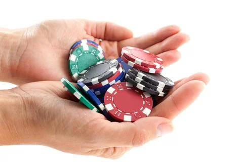 Multicolor poker chips handful Stock Photos