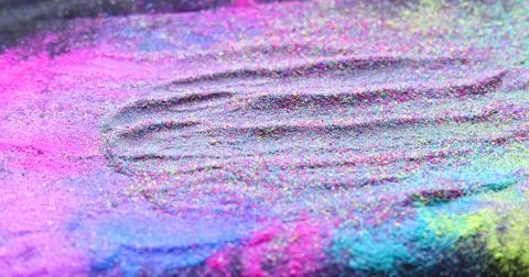 Multicolor powder explosion on black background. Colorful dust explode. Paint Foto stock