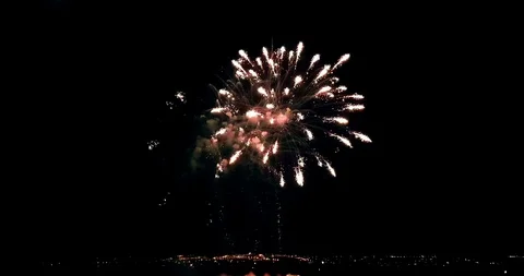 Multicolor real abstract blinking sparkle celebration fireworks lights on bla Video stock 124413127