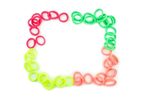 Multicolor rubber bands on white background Stock Photos