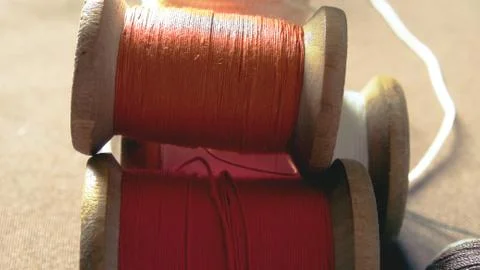 Multicolor sewing threads background bobbins vintage spools Stock Photos