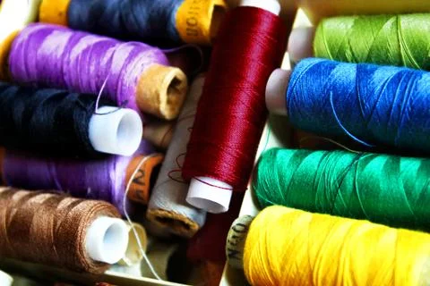 Multicolor sewing threads background colorful home Stock Photos