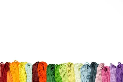 Multicolor sewing threads border Stock Photos