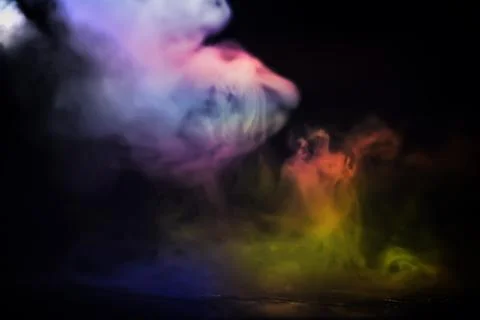 Multicolor smoke on black background 스톡 사진