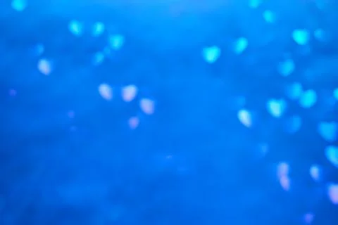 Multicolor space blurred three-dimensional heart-shaped bokeh, neon juicy bri 스톡 사진