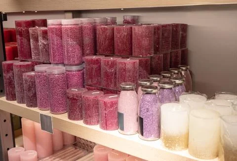 Multicolor store front or supermarket with decorative aromatic candles. Shopp Stock Photos