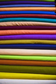 Multicolor textile fabrics pattern texture background Stock Photos