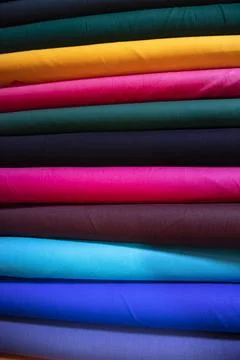 Multicolor textile fabrics pattern texture background Stock Photos