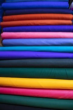 Multicolor textile fabrics pattern texture background Stock Photos