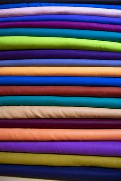 Multicolor textile fabrics pattern texture background Stock Photos