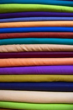 Multicolor textile fabrics pattern texture background Stock Photos
