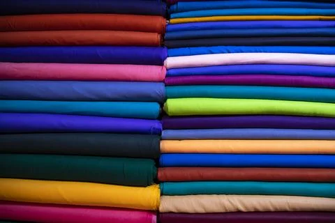 Multicolor textile fabrics pattern texture background Stock Photos