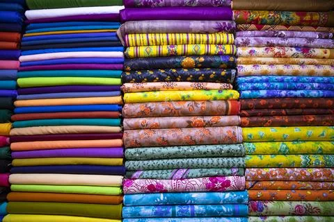 Multicolor textile printed fabrics pattern texture background wallpaper Stock Photos