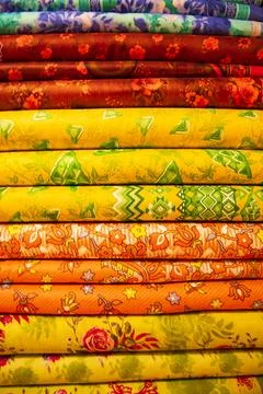 Multicolor textile printed fabrics pattern texture background wallpaper Stock Photos