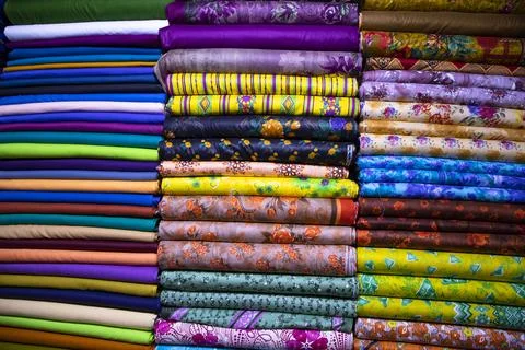 Multicolor textile printed fabrics pattern texture background wallpaper Foto stock