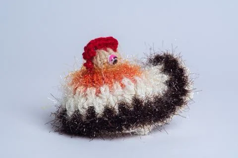 Multicolor, yarn, Easter chicken, lying on a white background Foto stock
